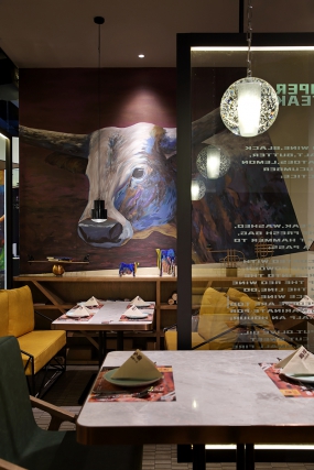 牛排餐厅装饰布局图,牛排餐厅空间设计效果图