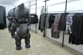 小型男服装店挂衣架装修效果图片大全